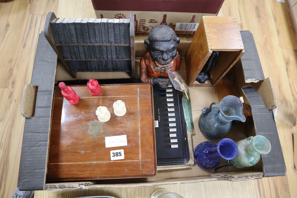 Three Roman style glass vessels, a 19th century bone chess set, miniature bindings, etc.